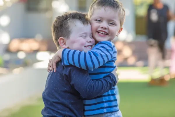 two-young-boys-outdoors-hugging-2026-01-09-09-36-55-utc-69b7e5185efdd