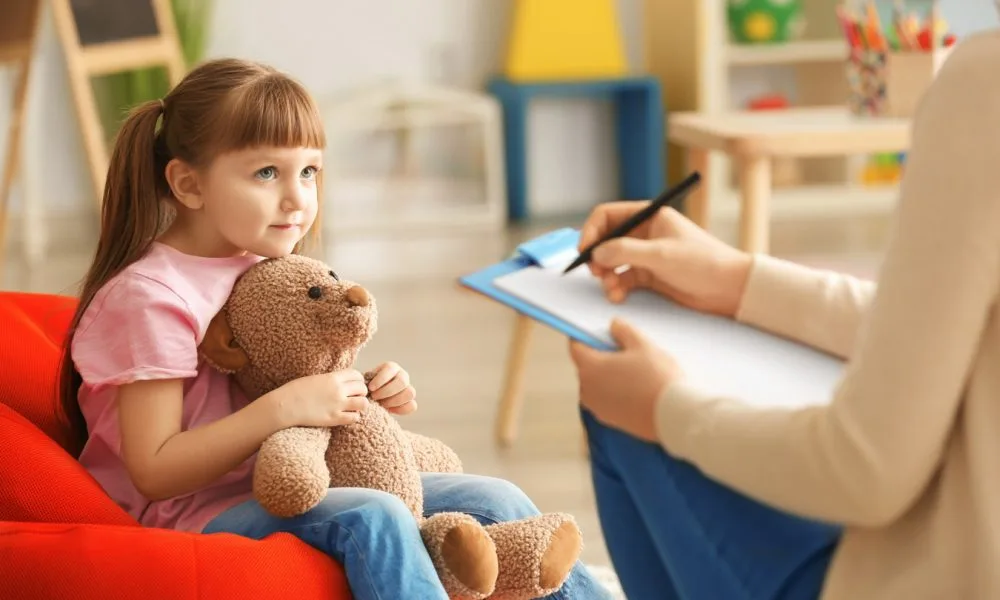 Cute little girl at child psychologist's office
