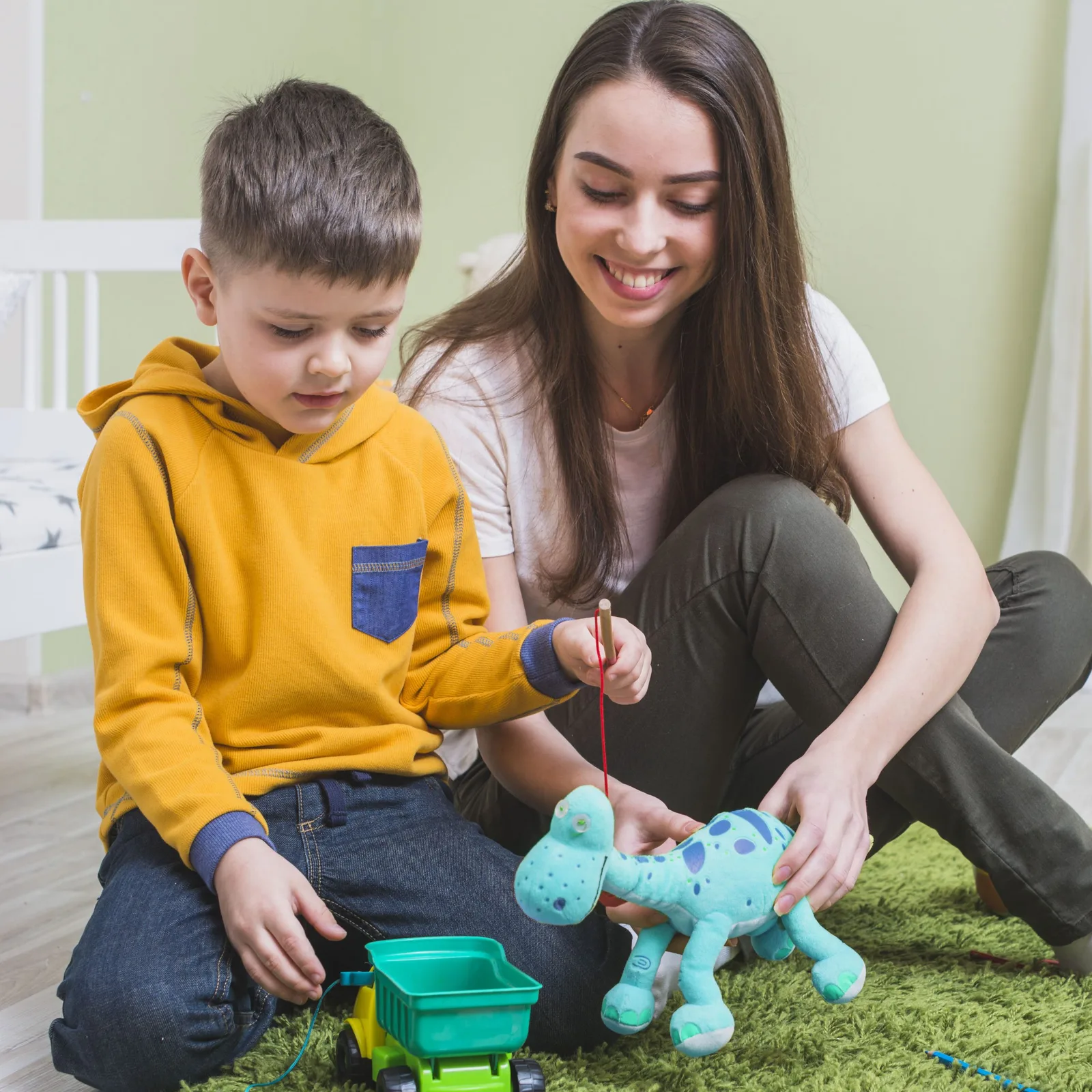mother-playing-toys-with-son